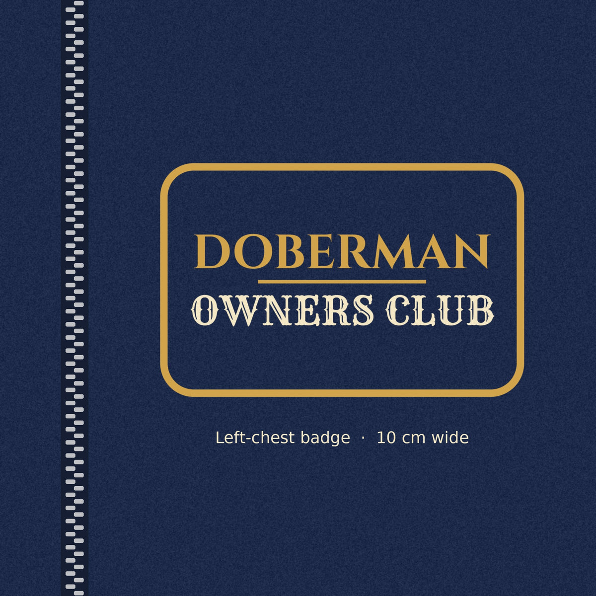 Close-up of the gold-outlined Doberman Owners Club badge on the left chest of the men's zip hoodie