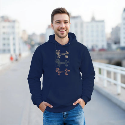 Man on a city balcony wearing the navy Dog Totem men's hoodie