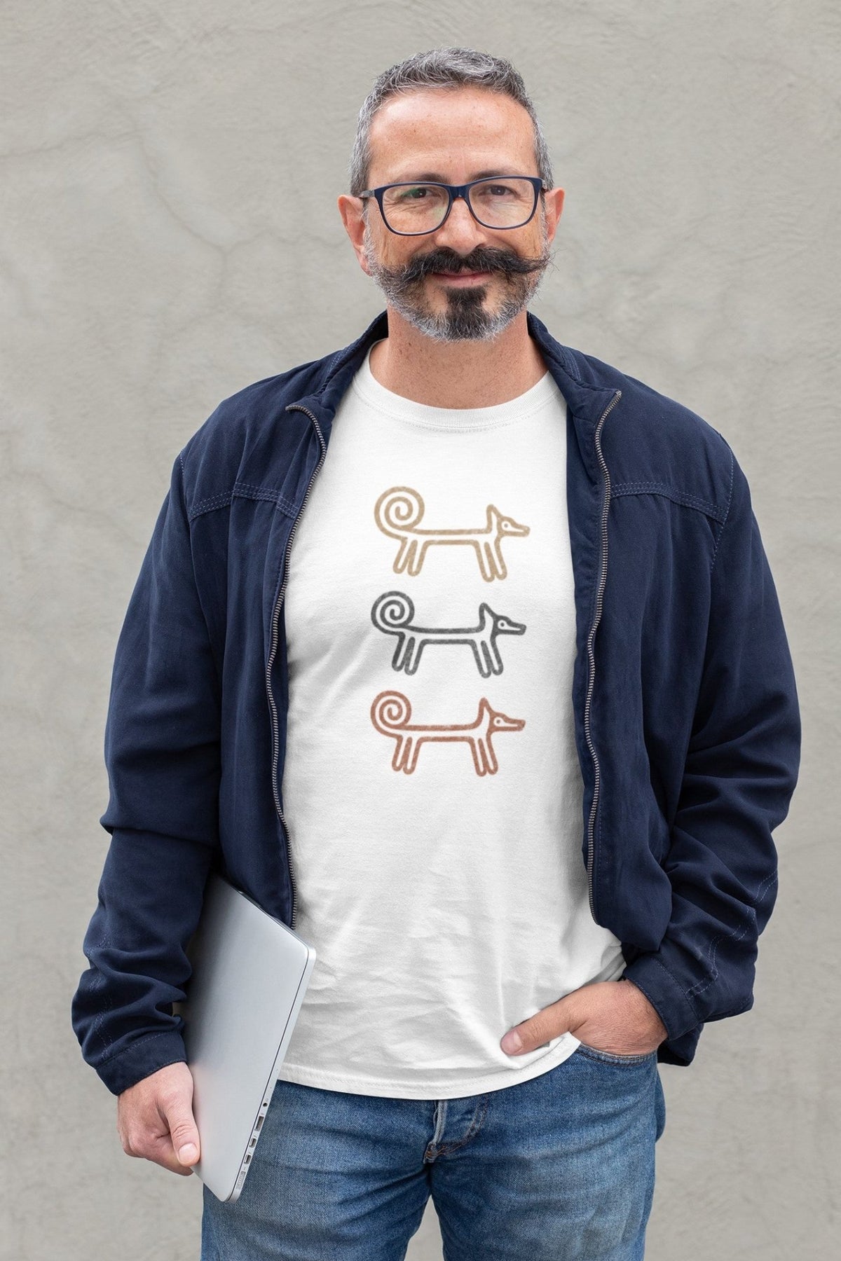Bearded man wearing a navy jacket over the white Dog Totem men's T-shirt