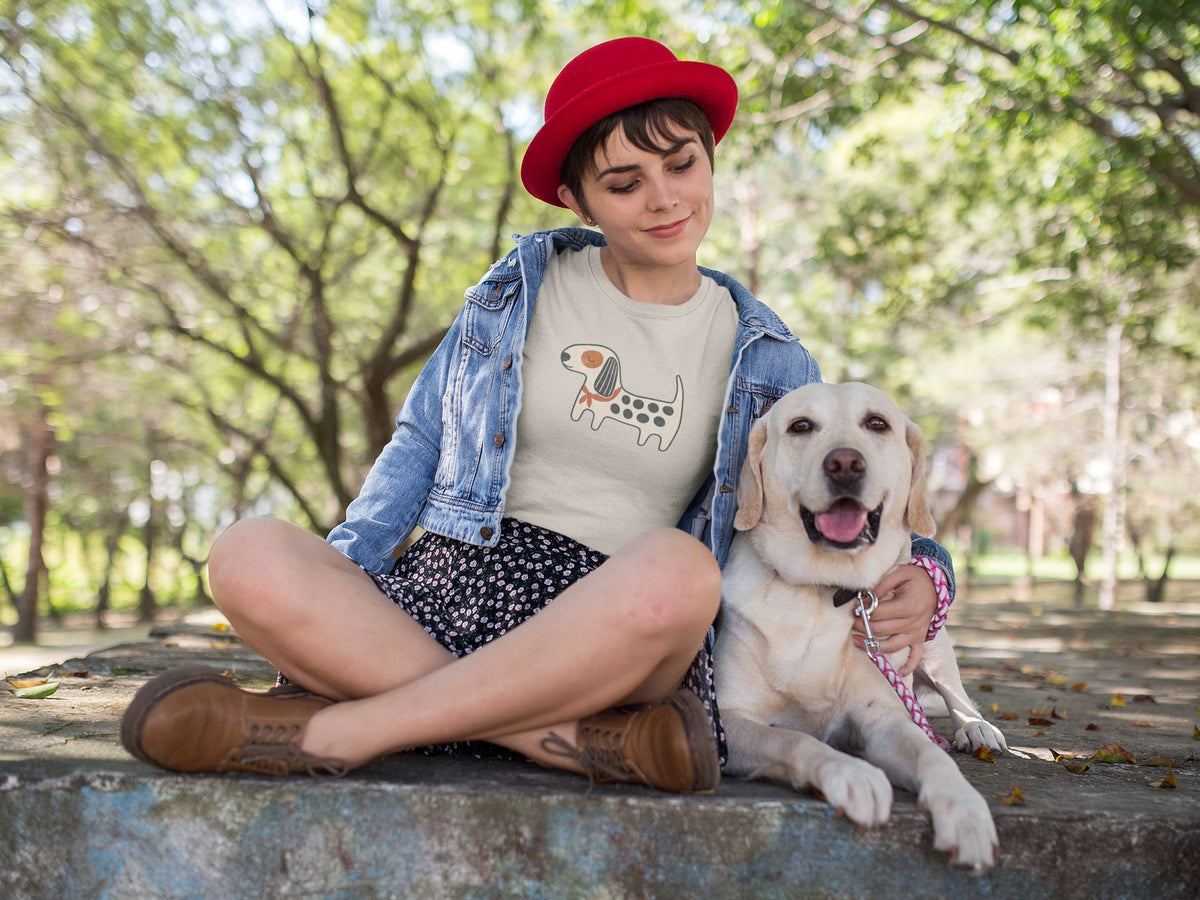 Woman in the sand Kawaii Dog T-shirt sitting in a park with her Golden Retriever