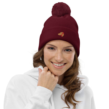Pom Pom beanie hat featuring embroidered Rhodesian Ridgeback logo - Hobbster