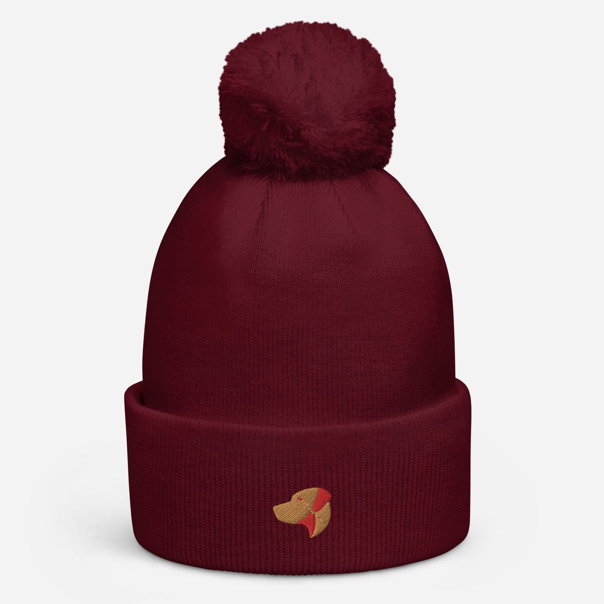 Pom Pom beanie hat featuring embroidered Rhodesian Ridgeback logo - Hobbster