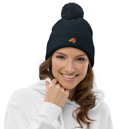 Pom Pom beanie hat featuring embroidered Rhodesian Ridgeback logo - Hobbster
