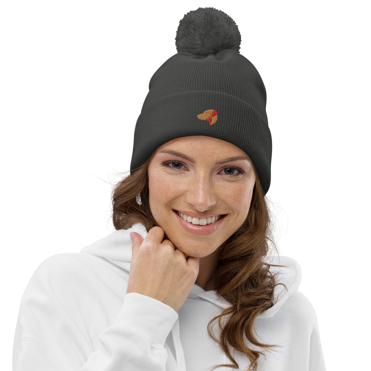 Pom Pom beanie hat featuring embroidered Rhodesian Ridgeback logo - Hobbster